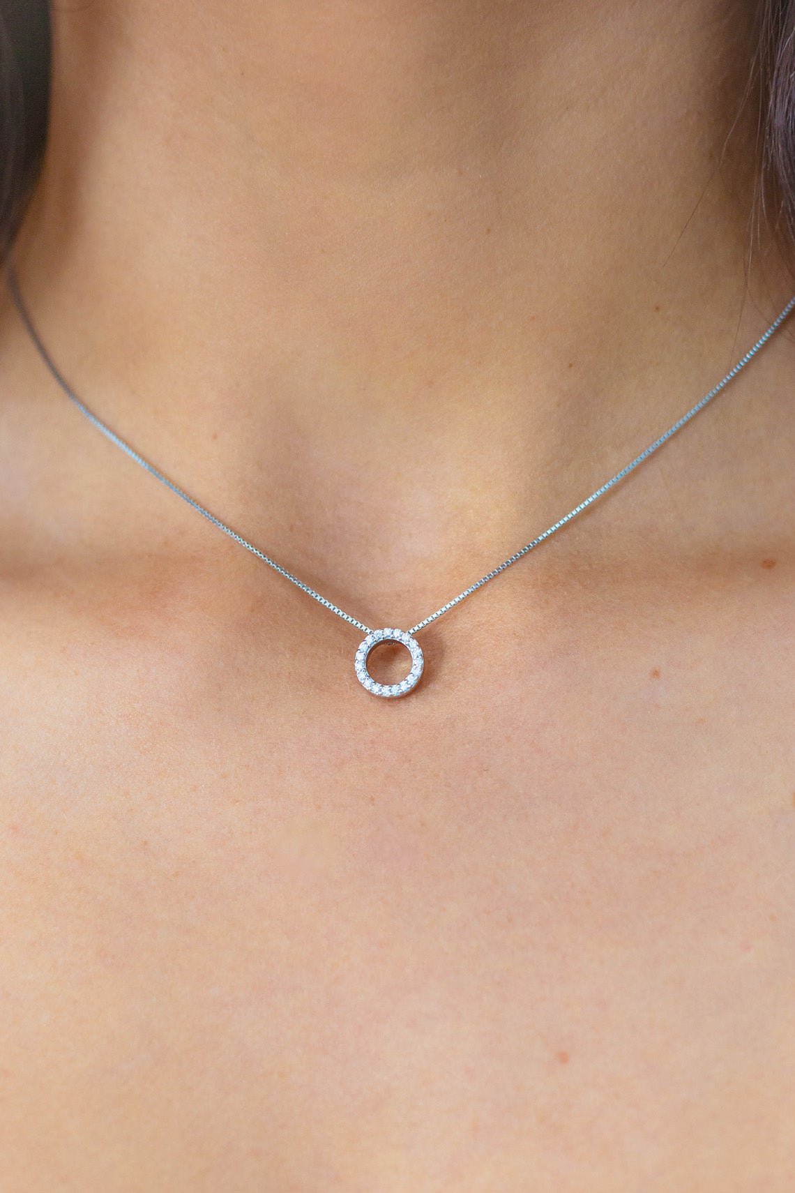 CIRCLE 0.15TCW IN 9CT WHITE GOLD PENDANT