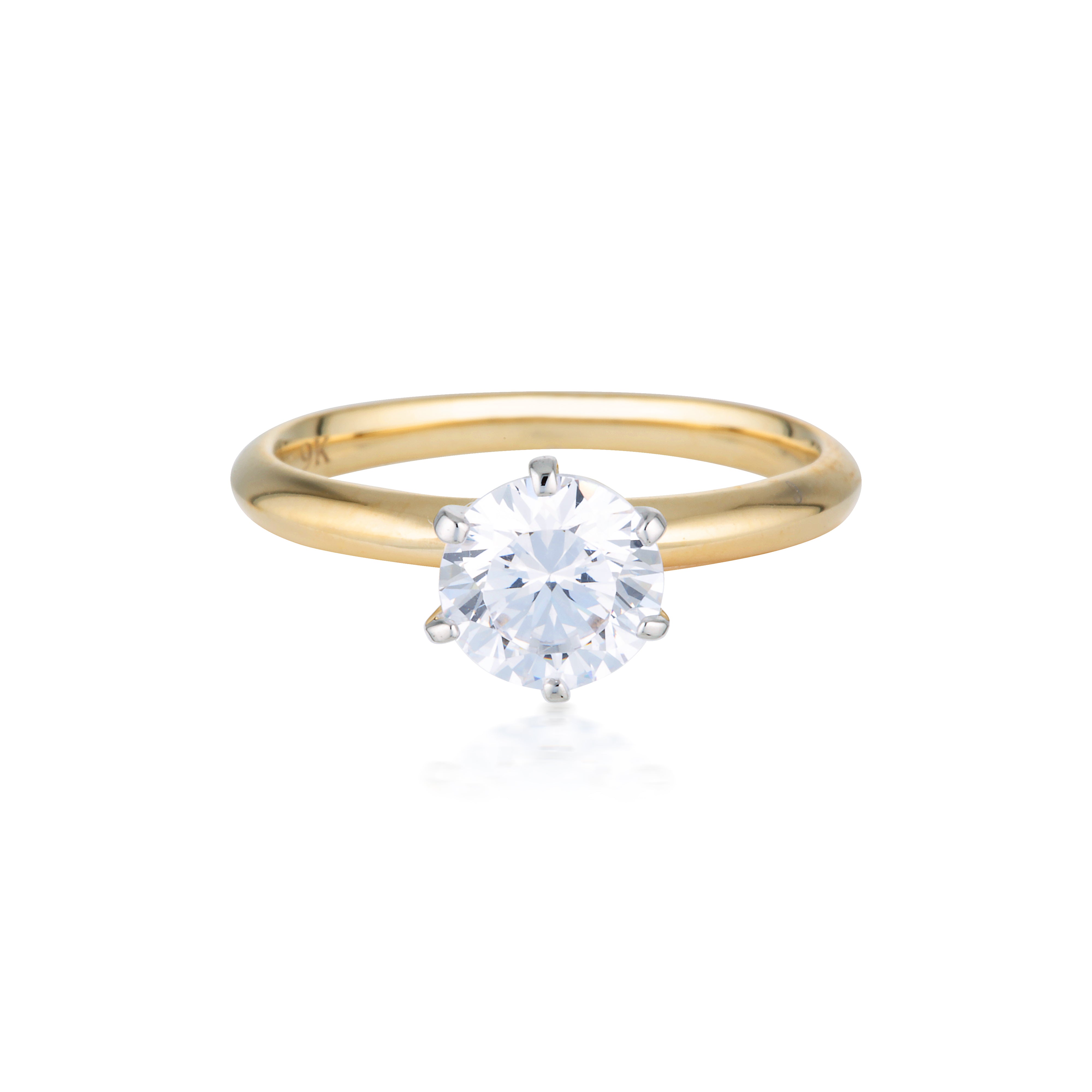 ROUND BRILLIANT CUT 1.25CTW MOISSANITE SOLITAIRE WITH KNIFE EDGE BAND IN YELLOW GOLD